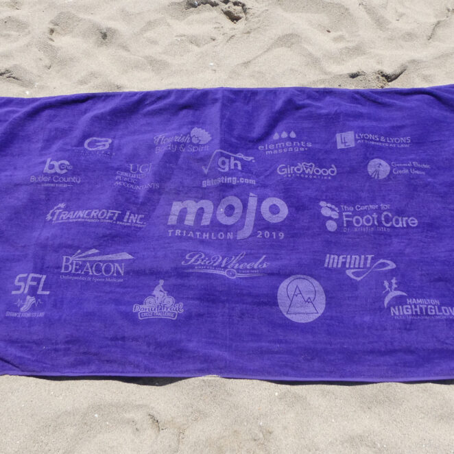 purple Beach towel tone on tone printing with sponsor logos